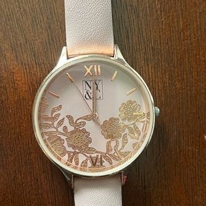 Womens fancy watch New York and Company. Gently used, pink band. Great condition